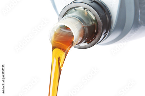 Photo: Poured industrial oil. On a white background. Poured industrial oil. On a white background.