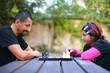 young couple playing chess game