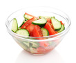 Fresh salad with tomatoes and cucumbers isolated on white