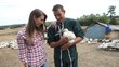 Couple of duck breeders walking outdoors