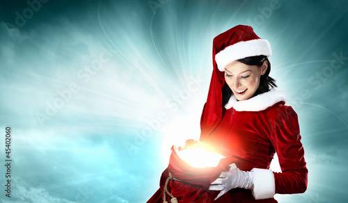 Photo: beautiful girl in santa costume beautiful girl in santa costume