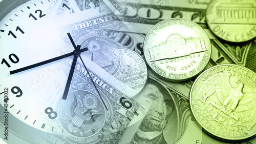 Photo: Clock and cash Clock and cash