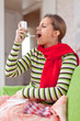 illness woman uses spray