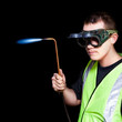Panelbeater in safety goggles