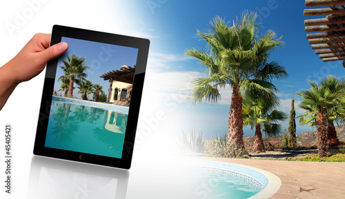 Photo: Swimming Pool, Palm and tablet pc Swimming Pool, Palm and tablet pc