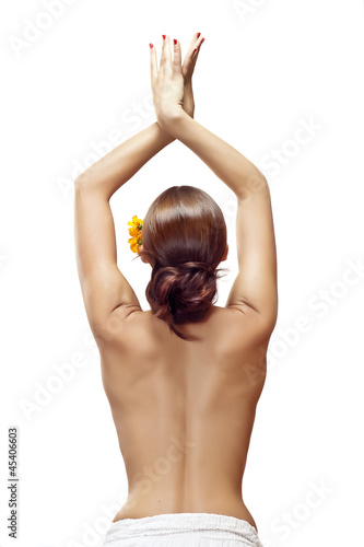 Photo: A beautiful woman, back view, isolated on white background A beautiful woman, back view, isolated on white background