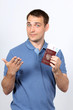 Man with money showing thumbs up