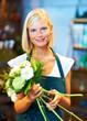 Placing the finishing touches on her beautiful bouquet