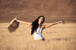 Photo: Young beautiful woman in a wheat field with white dress Young beautiful woman in a wheat field with white dress
