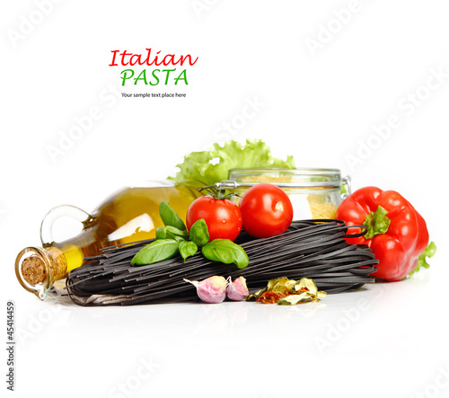 Photo: Italian Pasta with vegetables in wooden plate isolated on white. Italian Pasta with vegetables in wooden plate isolated on white.