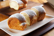 Foto: Rolled bread with sugar powder Rolled bread with sugar powder