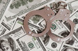 Dollars and handcuffs