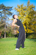 Photo: Attractive young man doing exercise in park Attractive young man doing exercise in park