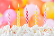 Photo: Five Birthday candles on colorful balloons background Five Birthday candles on colorful balloons background