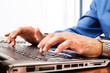 Businessman working at his laptop