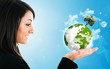 Woman holding the world in her hand