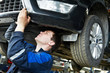 Foto: auto car repair mechanic at work auto car repair mechanic at work