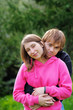 Young beautiful couple posing oudoors