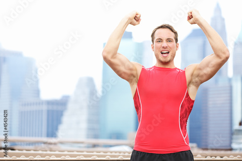 Photo: Winning athlete man celebrating Winning athlete man celebrating