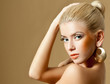 beautiful blonde in gold earrings