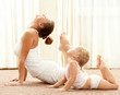 Mother and daughter doind exercise