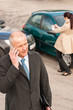 Man on the phone after colliding car