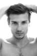 Foto: Young and handsome guy with water drops on his face Young and handsome guy with water drops on his face