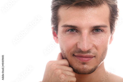 Photo: Young and handsome guy with water drops on his face Young and handsome guy with water drops on his face