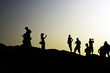 Foto: Dark silhouettes of tourists taking photos Dark silhouettes of tourists taking photos