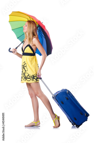 Photo: Woman going to summer vacation with suitcase Woman going to summer vacation with suitcase