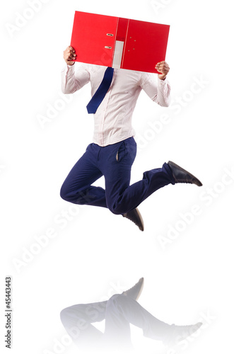 Photo: Naked businessman jumping on white Naked businessman jumping on white