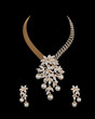 Close up of diamond necklace with diamond ear ring