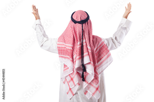Photo: Arab man praying on the white Arab man praying on the white