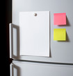 Empty paper sheet on fridge door