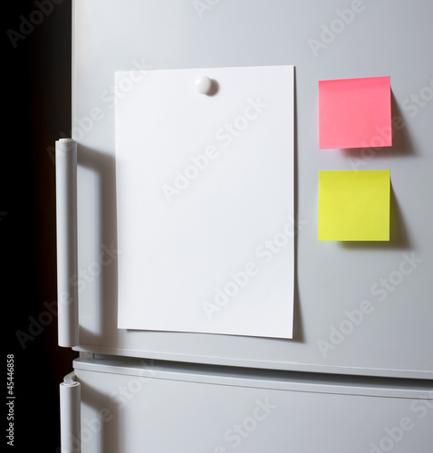 Photo: Empty paper sheet on fridge door Empty paper sheet on fridge door
