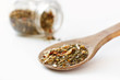 Mediterranean salad spices in oak spoon