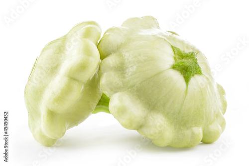 Photo: Two types of Patty pan Squash on white background Two types of Patty pan Squash on white background