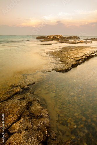 Photo: Reefs on Adriatic Sea at Sunset Reefs on Adriatic Sea at Sunset