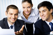 Three businesspeople working at office