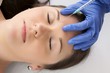 woman get a botox injection