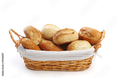 Photo: bread in wicker basket isolated on white bread in wicker basket isolated on white