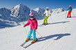 Skiing, winter, ski lesson - skiers on mountainside