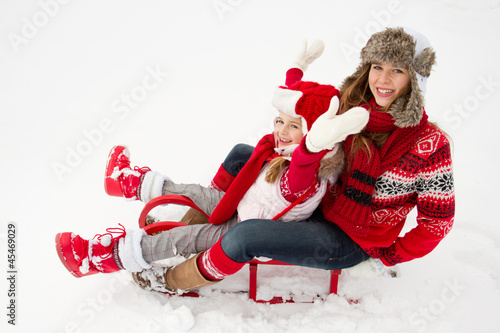 Photo: Winter fun , snow, sledding at winter time Winter fun , snow, sledding at winter time