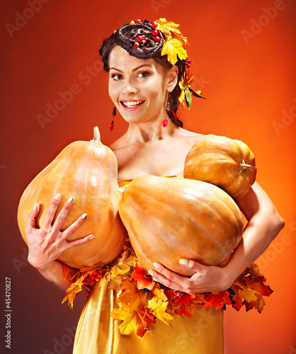 Photo: Woman holding autumn basket. Woman holding autumn basket.