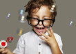 little boy with glasses and soap bubbles