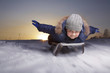 happy boys on sled