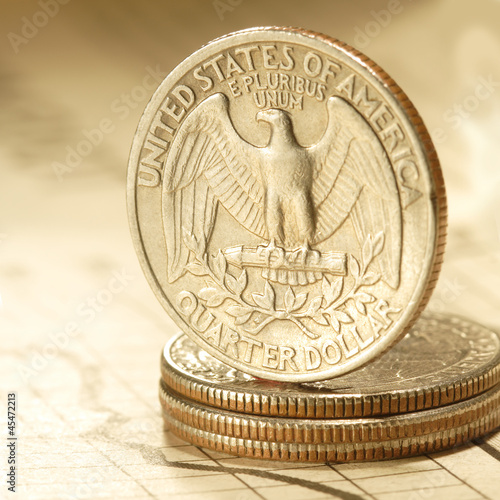 Photo: quarter dollar on chart quarter dollar on chart