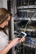 Foto: Concentrated woman doing data storage Concentrated woman doing data storage