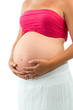Woman holding her pregnant tummy.