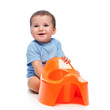 Photo: Happy little boy with potty Happy little boy with potty